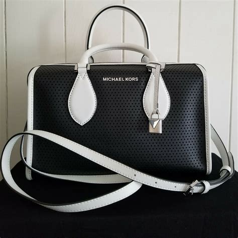 michael kors keating black white|Michael Kors black shoulder handbags.